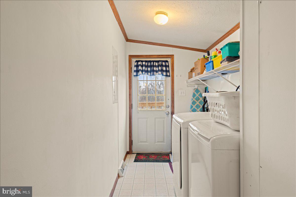 230 Cedar Flat Road Warfordsburg, PA 17267 - Photo 3 of 44 a hallway with a washer and dryer