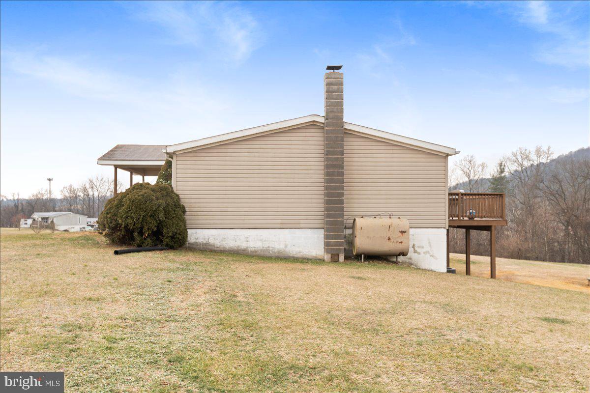 230 Cedar Flat Road Warfordsburg, PA 17267 - Photo 39 of 44 a front view of a house with a yard and garage