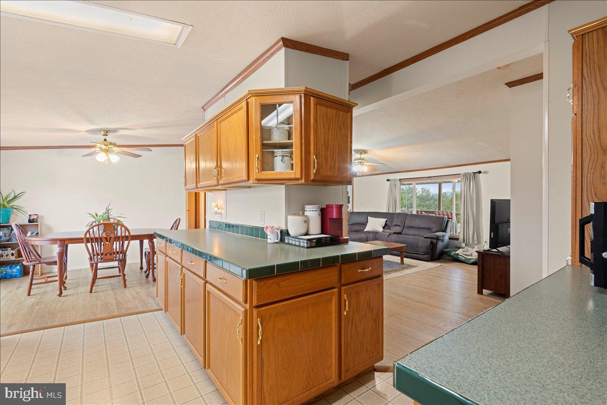 230 Cedar Flat Road Warfordsburg, PA 17267 - Photo 5 of 44 a kitchen with a cabinets and chairs