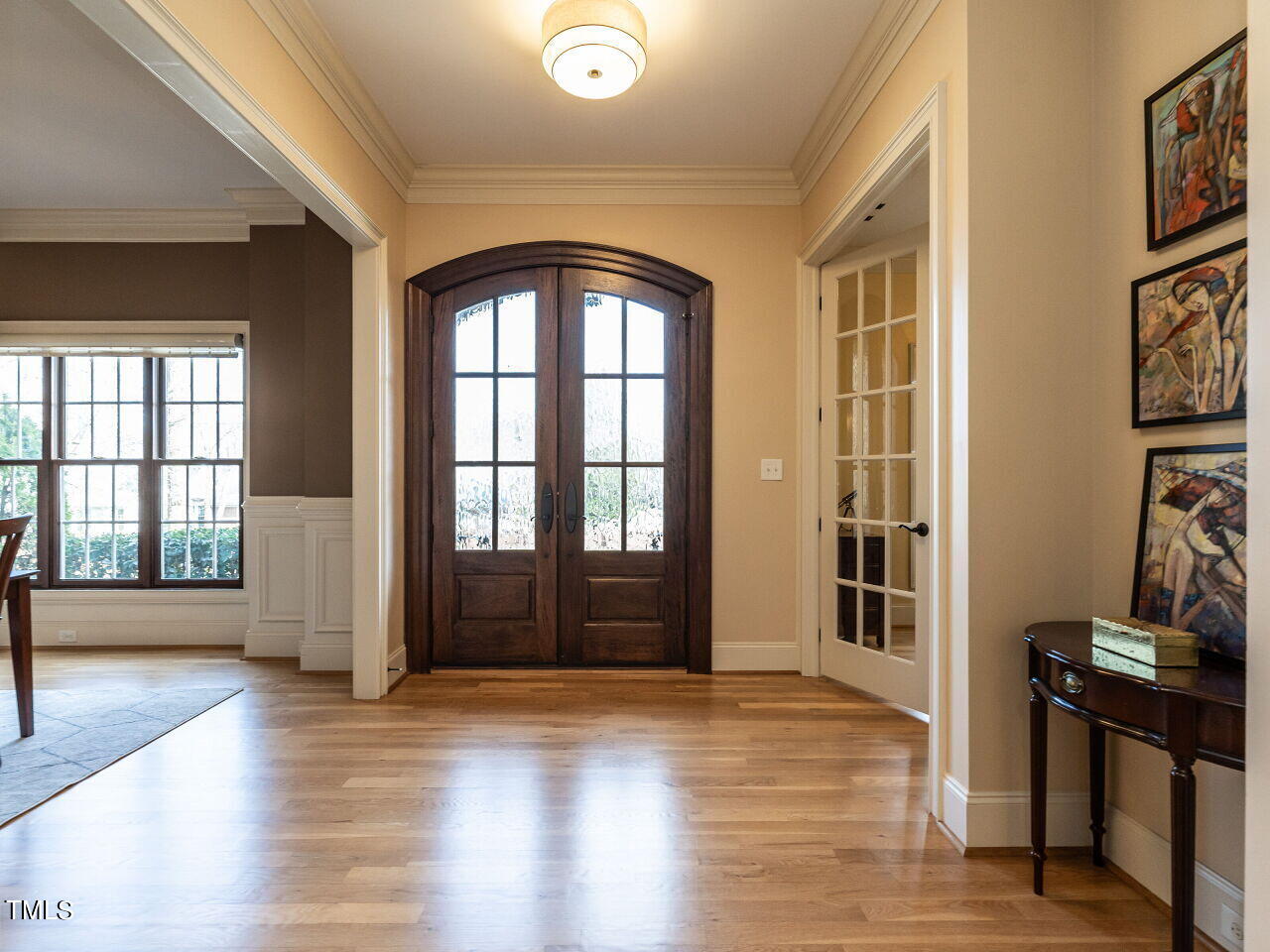 3421 Ebenezer Church Road Raleigh, NC 27612 - Photo 6 of 43 an empty room with wooden floor and furniture