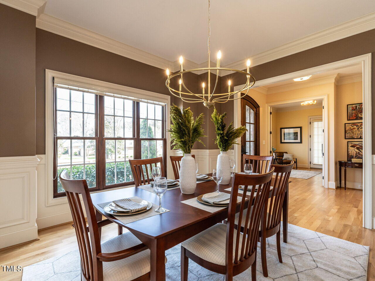 3421 Ebenezer Church Road Raleigh, NC 27612 - Photo 9 of 43 a dining room with furniture window and wooden floor