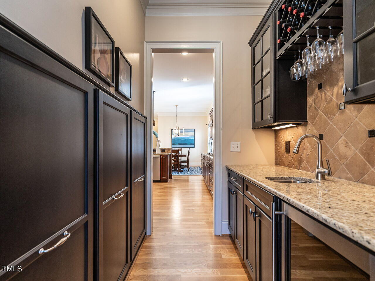 3421 Ebenezer Church Road Raleigh, NC 27612 - Photo 10 of 43 a kitchen with stainless steel appliances granite countertop a refrigerator and a sink
