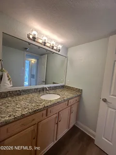 a view of porch with wooden floor