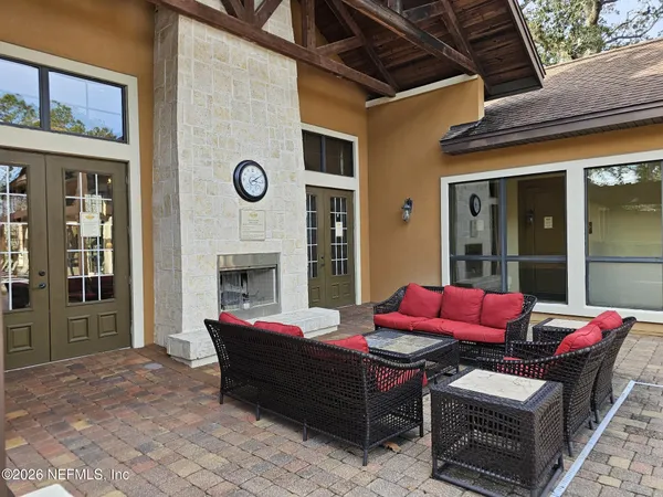 a building outdoor space with patio furniture
