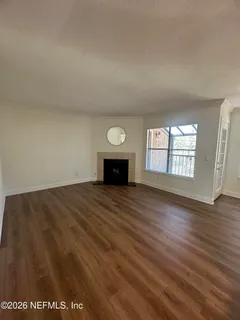 a kitchen with granite countertop stainless steel appliances and wooden cabinets