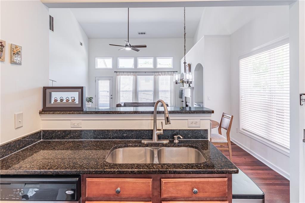 3487 Harvest Ridge Lane Northeast Buford, GA 30519 - Photo 13 of 34 a kitchen with a sink and a large window