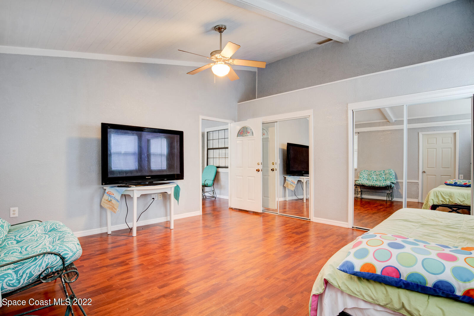 1250 North Carpenter Road Titusville, FL 32796 - Photo 28 of 52 a living room with furniture and a flat screen tv