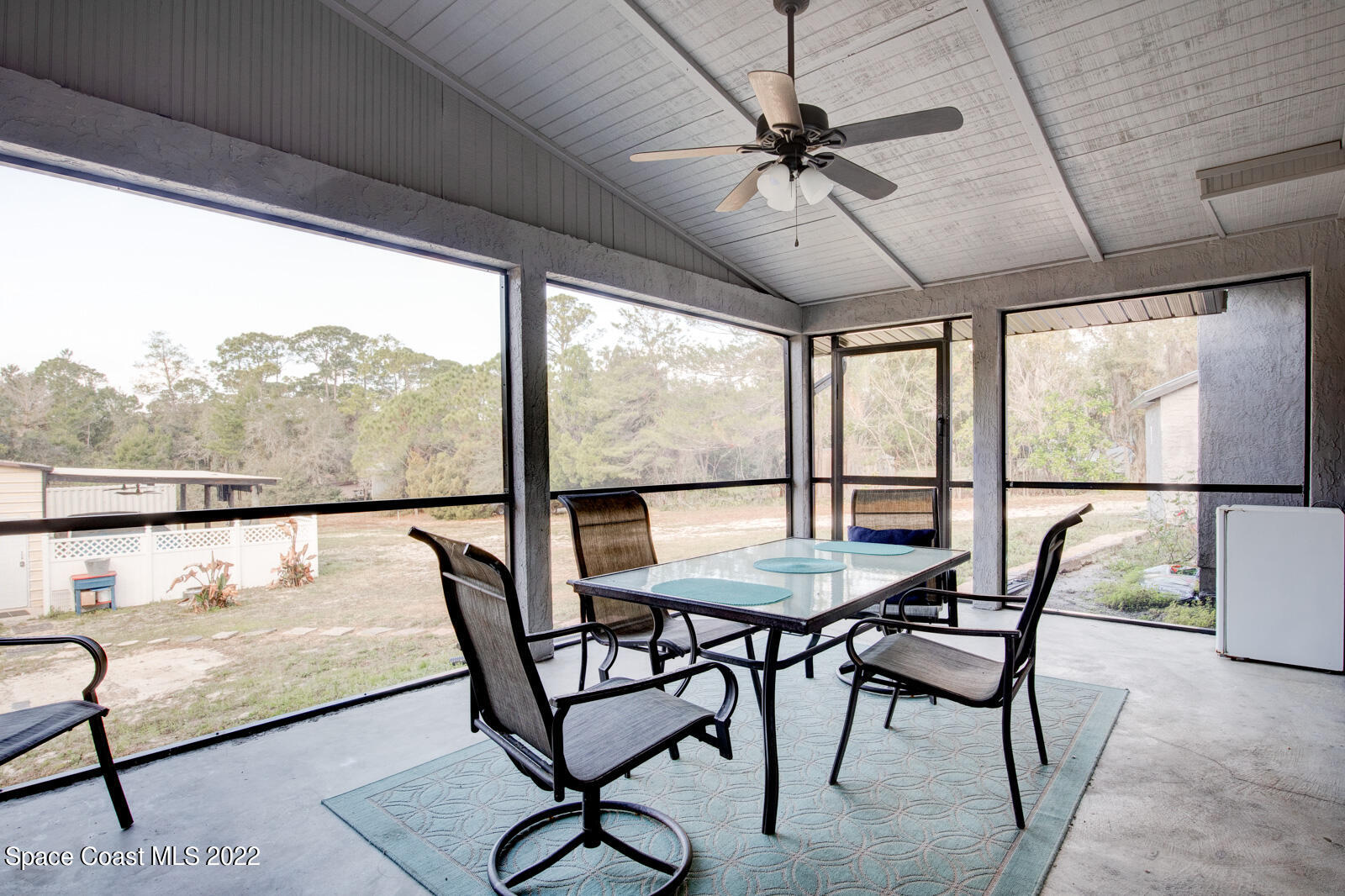1250 North Carpenter Road Titusville, FL 32796 - Photo 36 of 52 a view of a room with furniture window and outside view