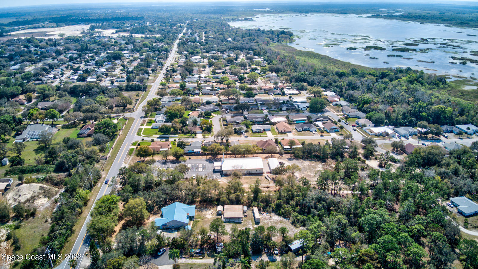 1250 North Carpenter Road Titusville, FL 32796 - Photo 50 of 52 an aerial view of multiple house