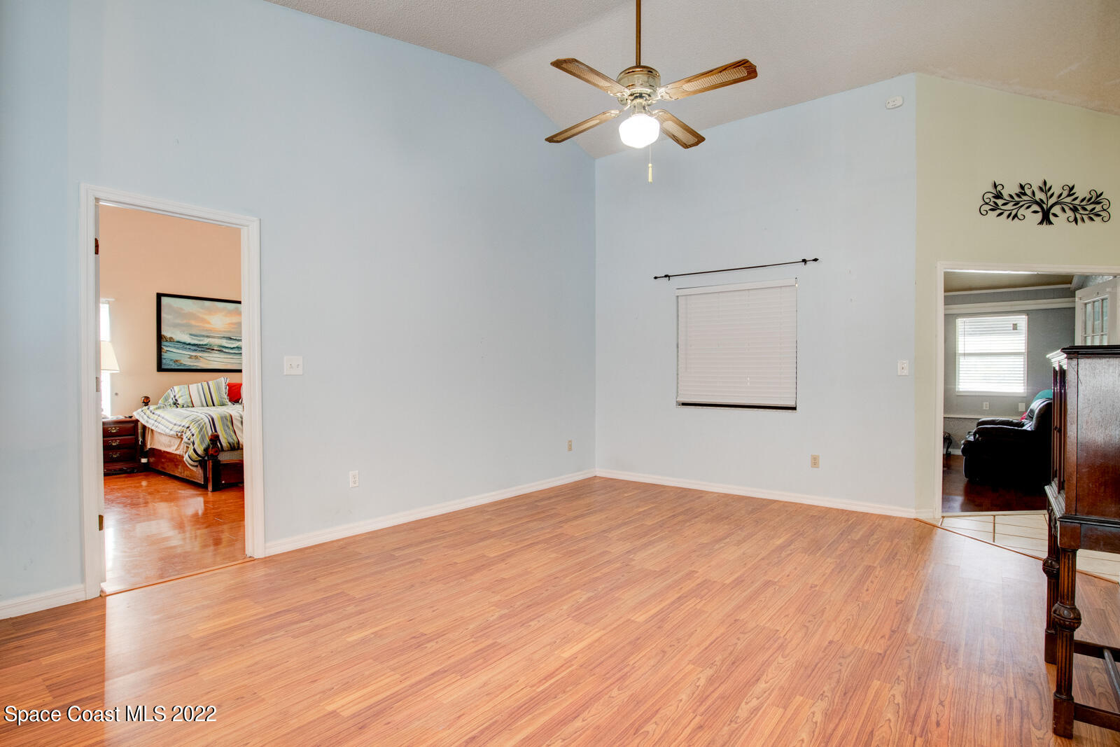 1250 North Carpenter Road Titusville, FL 32796 - Photo 9 of 52 a view of a room with wooden floor