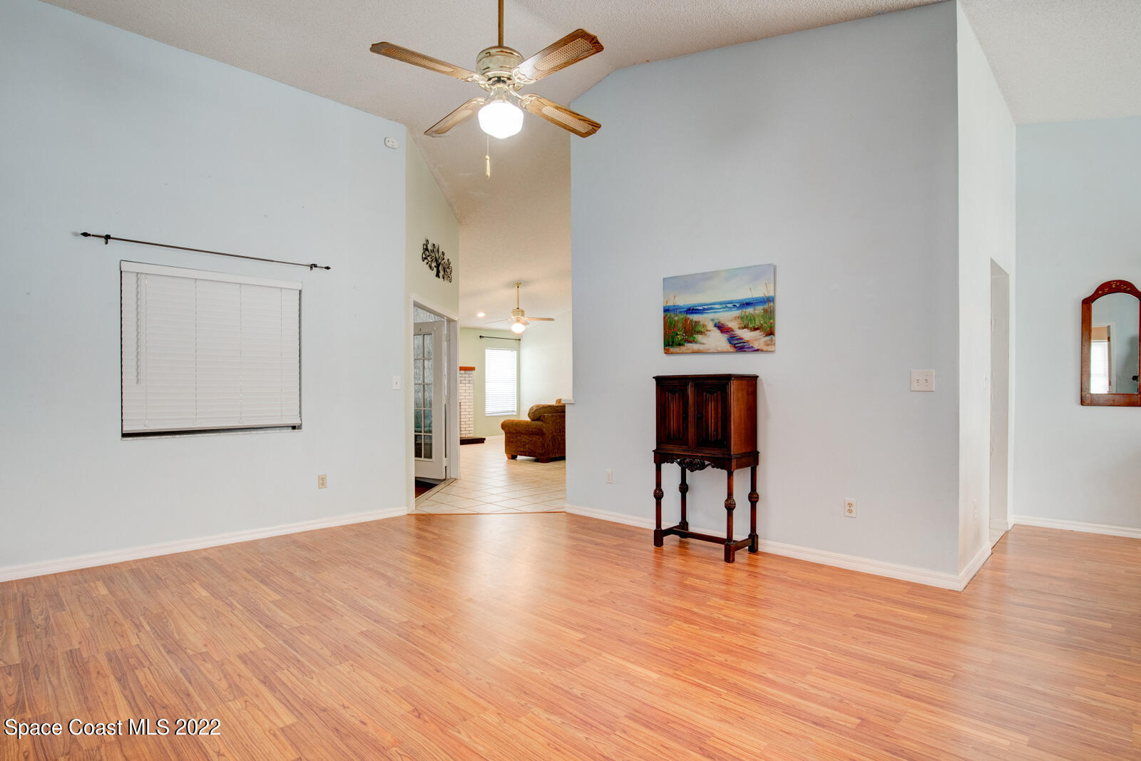 1250 North Carpenter Road Titusville, FL 32796 - Photo 10 of 52 a view of empty room with wooden floor