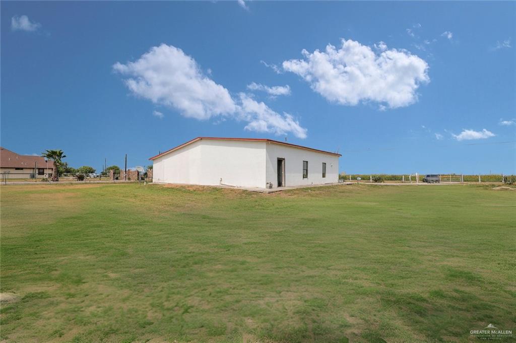 26821 Brushline Road Edinburg, TX 78542 - Photo 11 of 11 a view of a house with a big yard