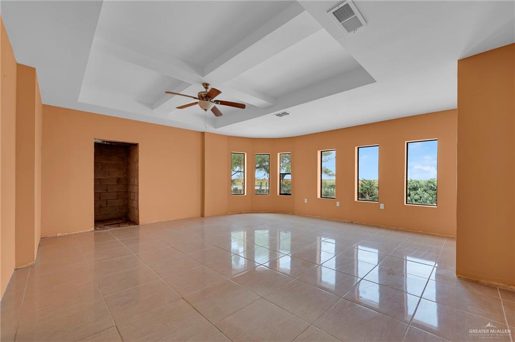26821 Brushline Road Edinburg, TX 78542 - Photo 2 of 11 a view of an empty room with a window