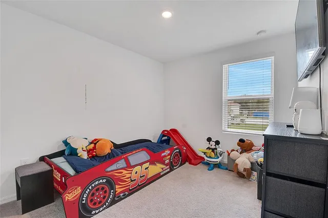 a workspace with furniture and bedroom