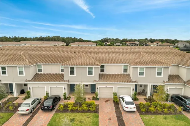 a view of a door side of a brick wall