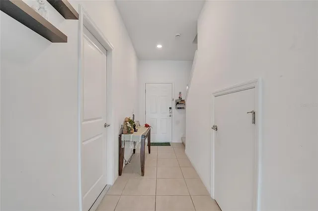 a hallway with a white stove
