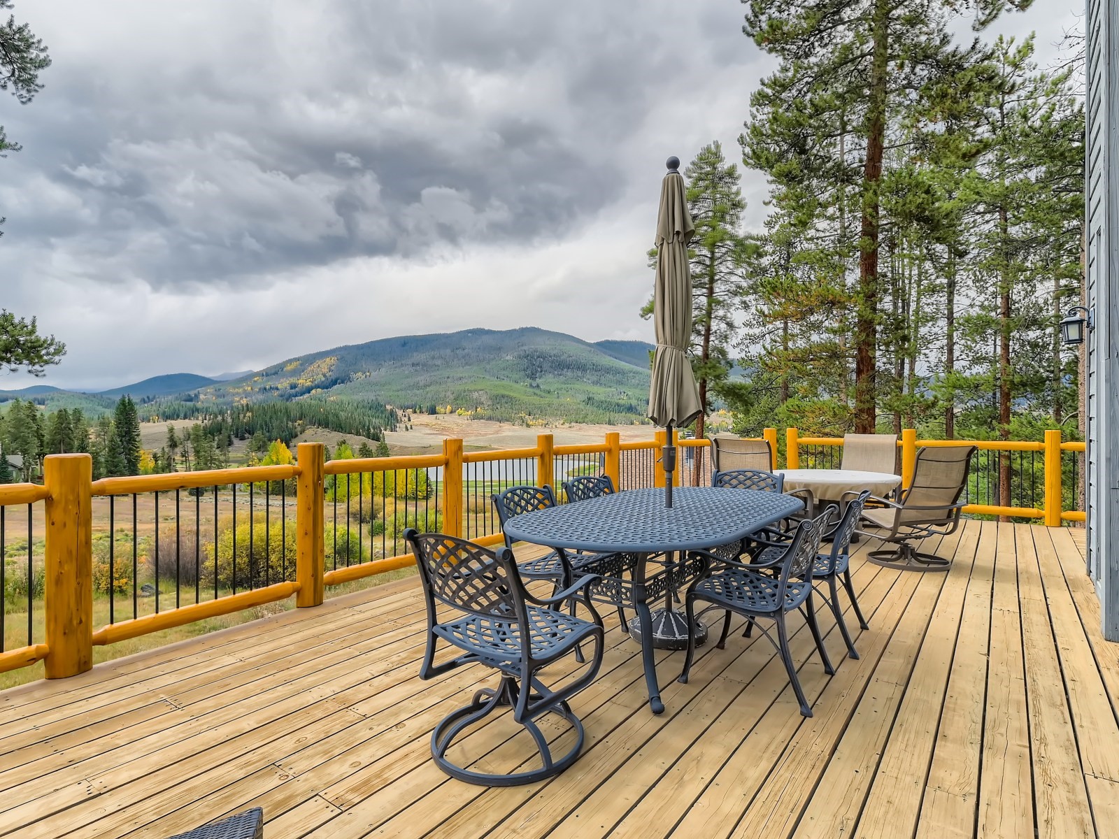 1649 Keystone Ranch Road Keystone, CO 80435 - Photo 1 of 27 Deck with view of the golf course and stream.