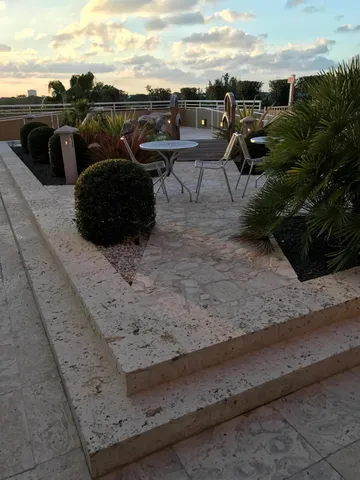 a view of roof with outdoor seating