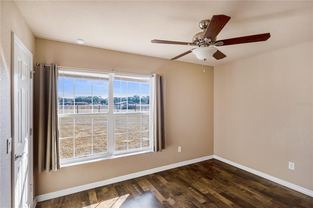 4495 Southeast 150th Street Summerfield, FL 34491 - Photo 18 of 76 a view of an empty room with a window