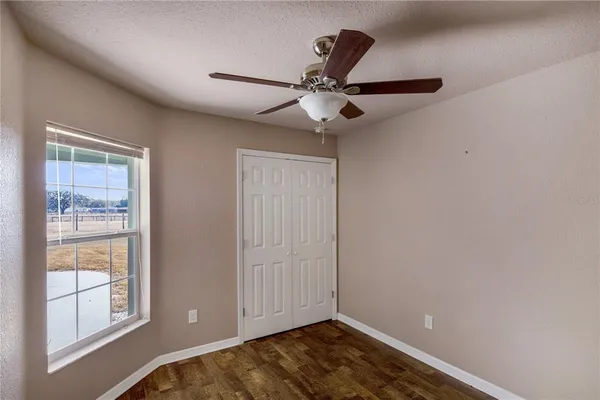 a kitchen with stainless steel appliances a refrigerator and a stove