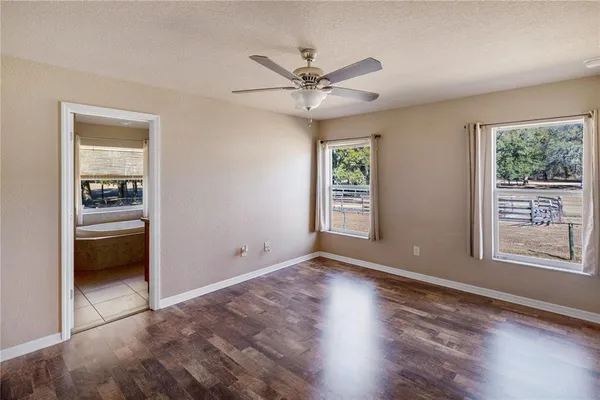 a view of an empty room and window
