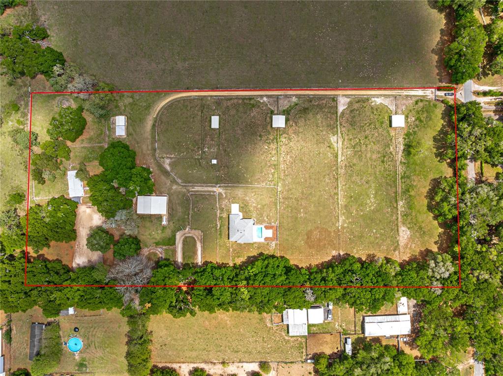 4495 Southeast 150th Street Summerfield, FL 34491 - Photo 75 of 76 a view of a fountain in front of a house