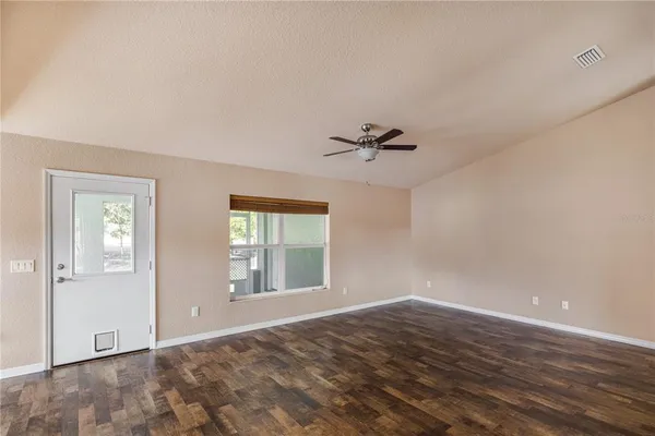 a kitchen with stainless steel appliances a refrigerator and a stove