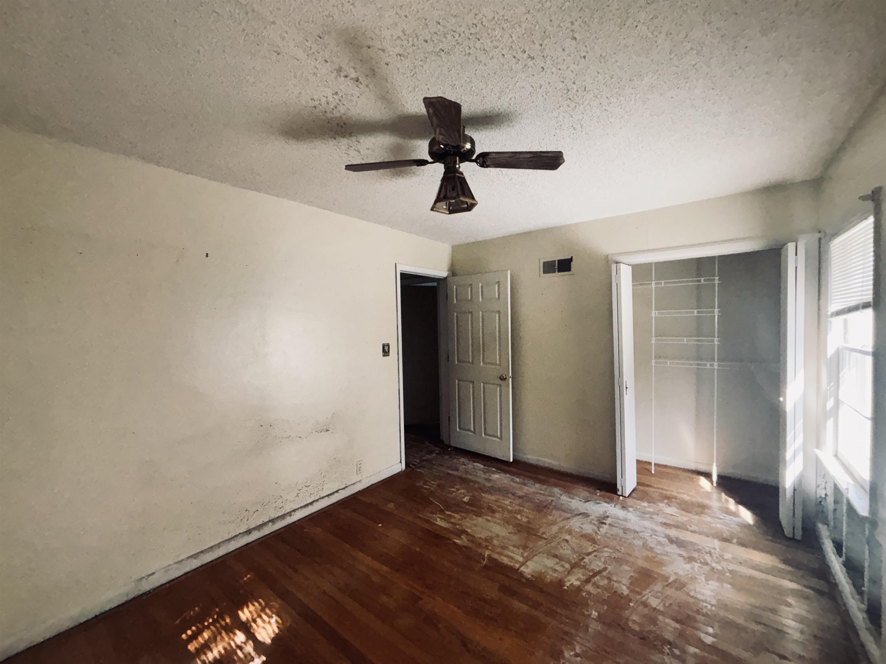 1331 West Logan Street Freeport, IL 61032 - Photo 25 of 30 a view of empty room with wooden floor