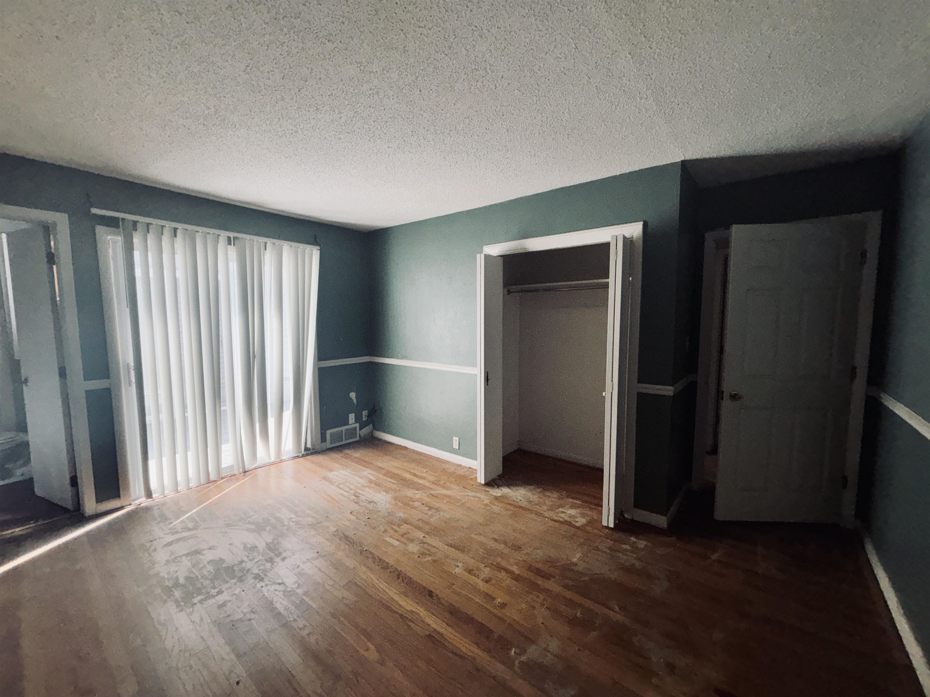 1331 West Logan Street Freeport, IL 61032 - Photo 27 of 30 an empty room with windows