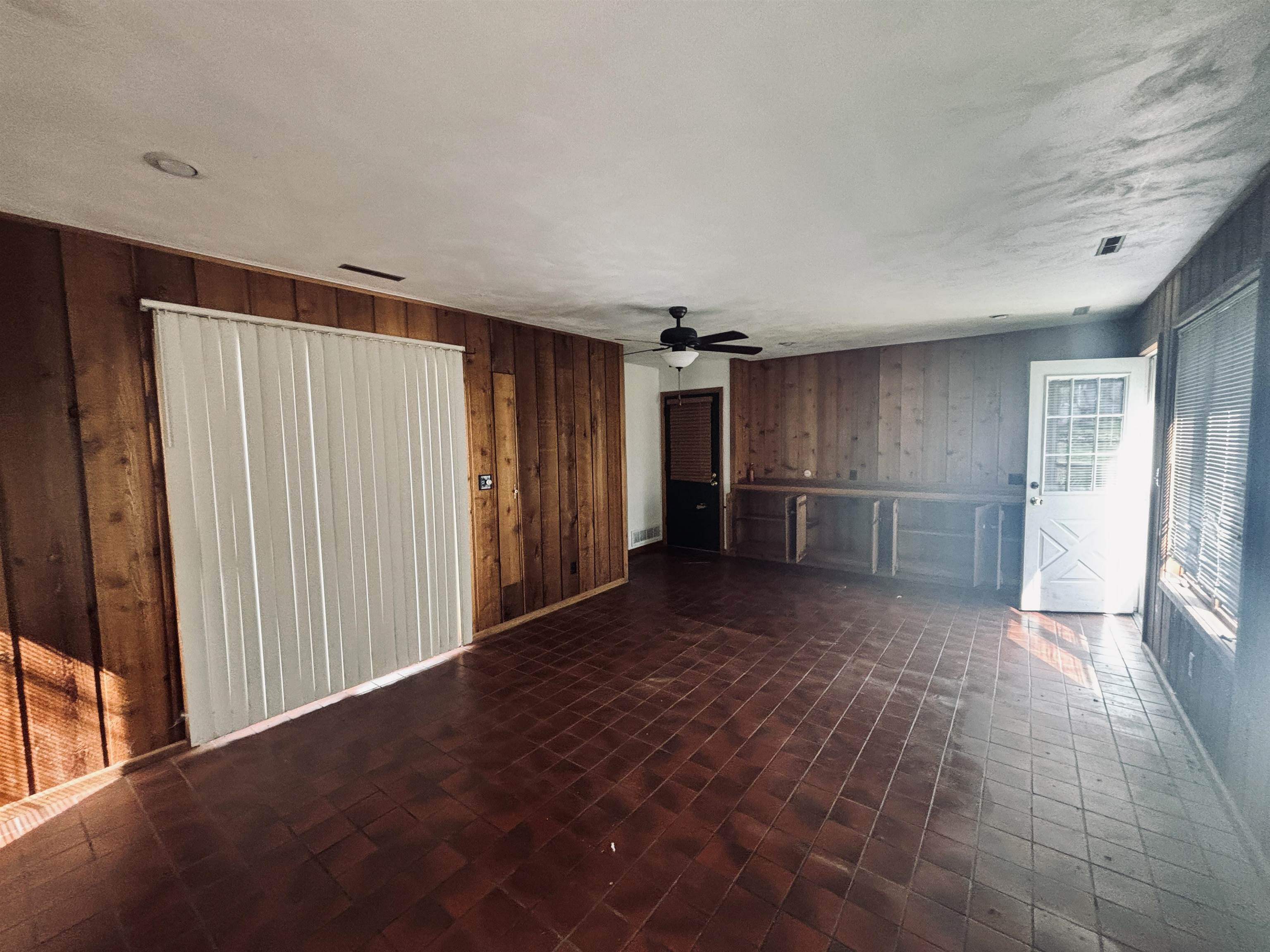 1331 West Logan Street Freeport, IL 61032 - Photo 3 of 30 a view of entryway with wooden floor