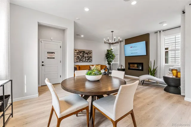 a hallway with front door with wooden floor