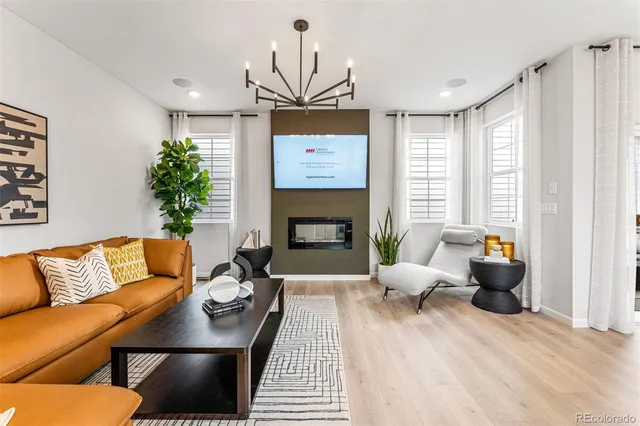 a view of a dining room with furniture and window