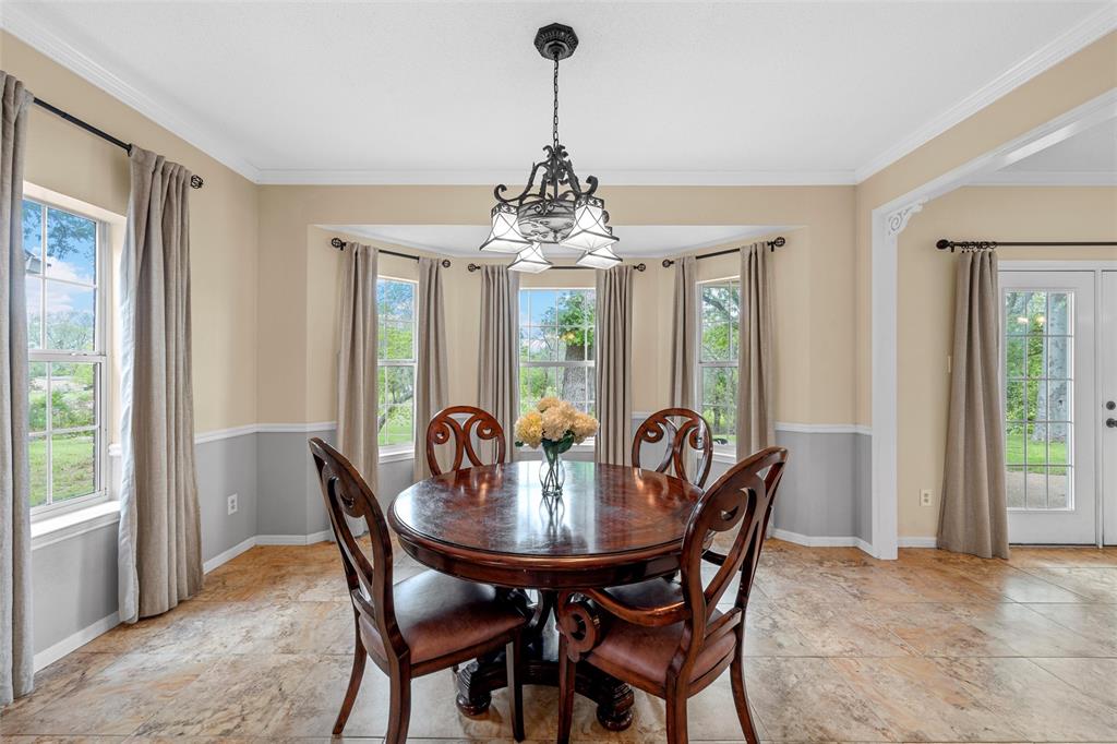 743 Stillwater Road Waco, TX 76708 - Photo 12 of 40 a dining room with furniture window and outside view