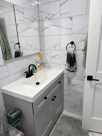 a bathroom with a sink and a toilet