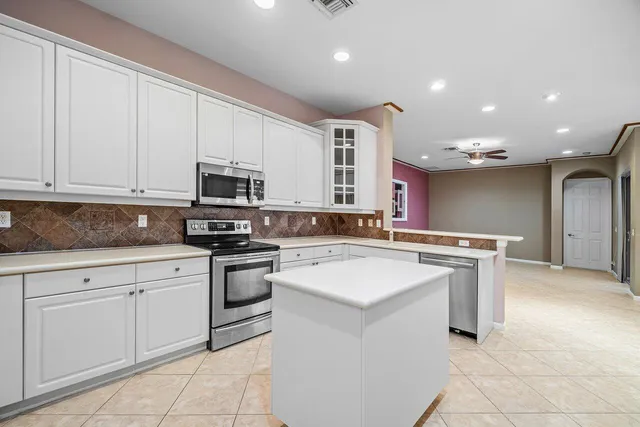 an aerial view of house with yard