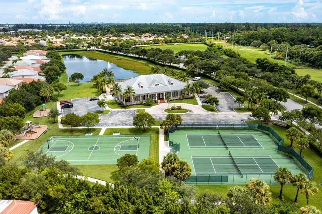 $695,000 | 473 Cottagewood Lane, Royal Palm Beach, FL 33411
