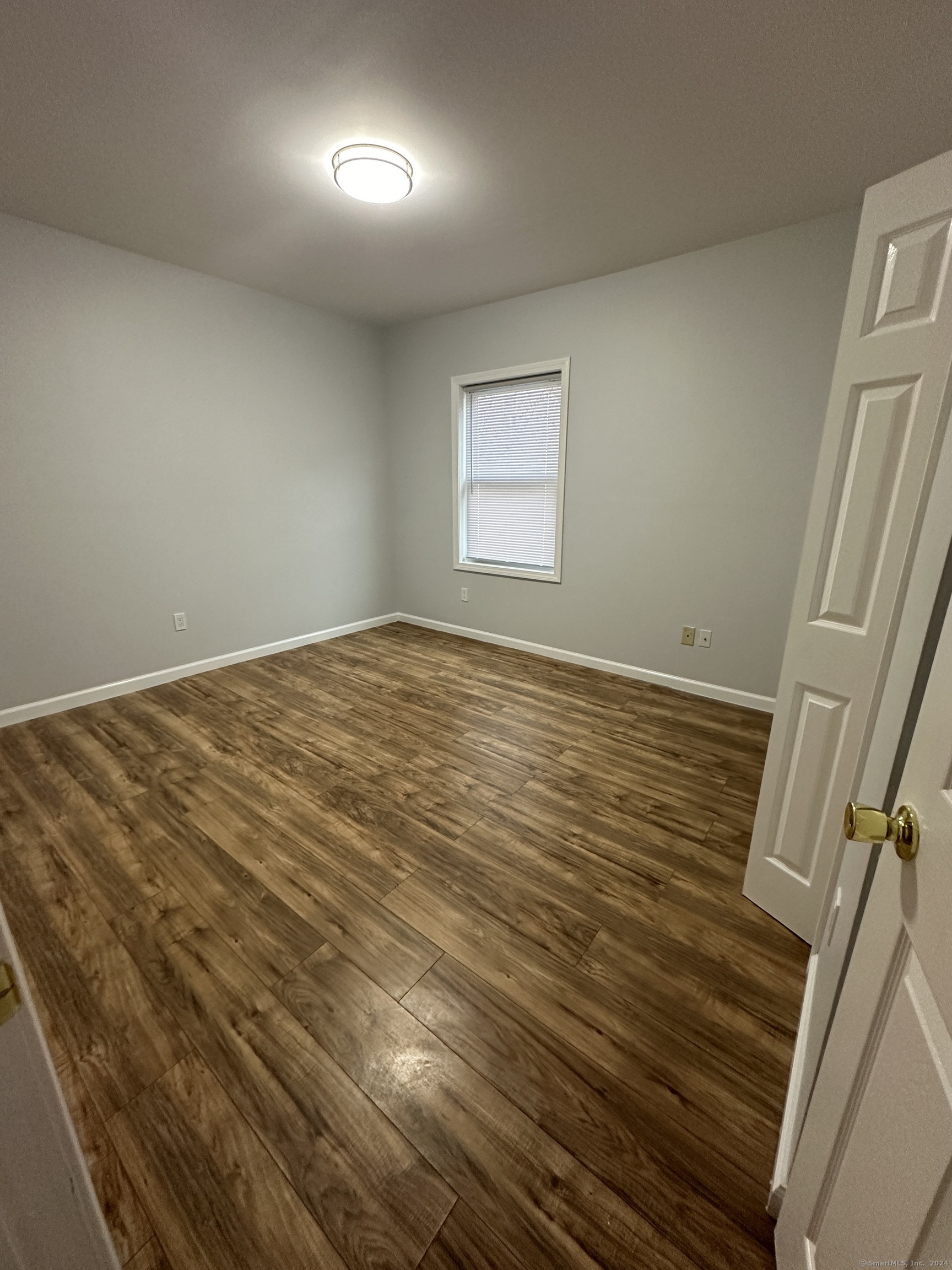 49 Howard Street Waterbury, CT 06705 - Photo 6 of 8 a view of an empty room