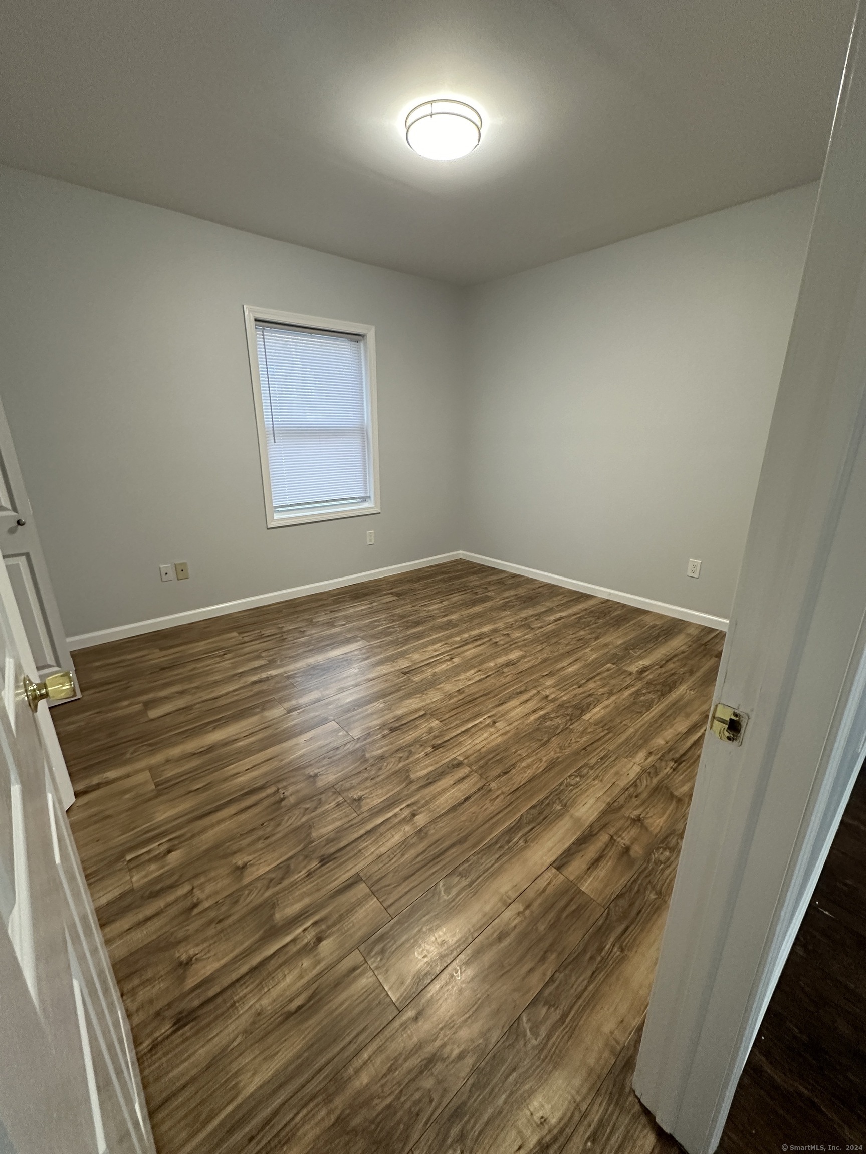 49 Howard Street Waterbury, CT 06705 - Photo 8 of 8 en empty room with window