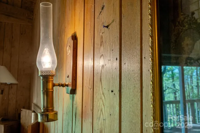a view of a livingroom with furniture and a flat screen tv
