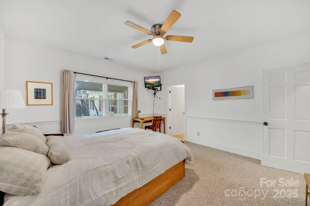 a bathroom with a double vanity sink mirror and shower