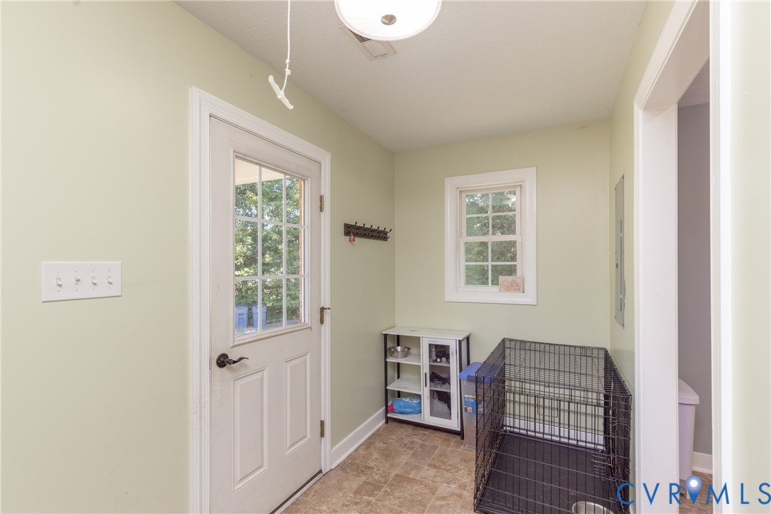 219 Pine Ridge Road Aylett, VA 23009 - Photo 19 of 38 Mud room/Laundry room with door leading to side st