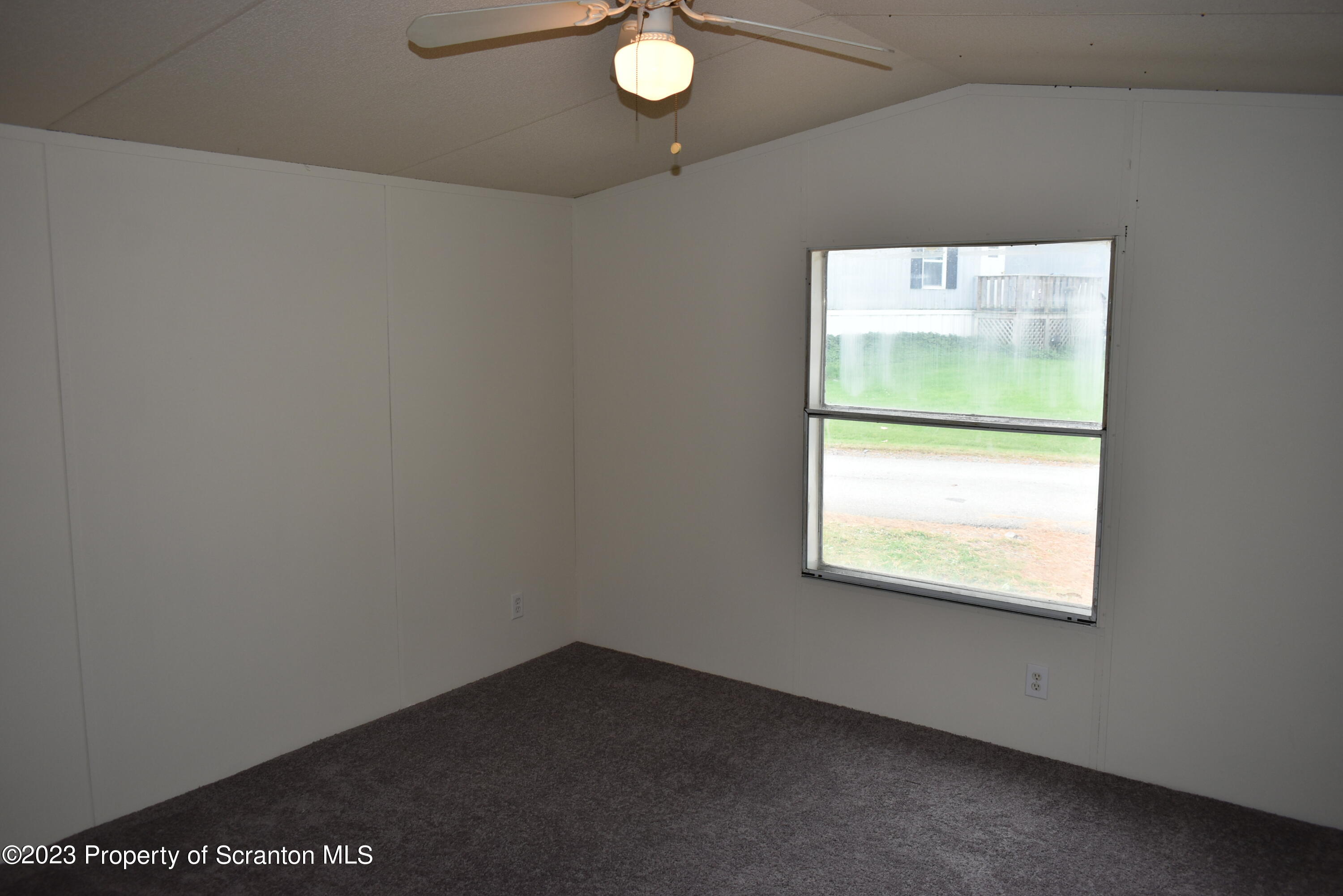 940 Nowlan Road, Unit 6 Port Crane, NY 13833 - Photo 11 of 11 a view of an empty room with a window