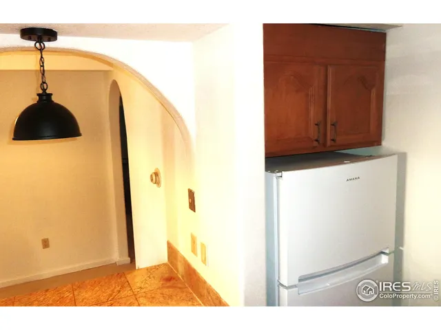 a view of a living room with a wooden floor