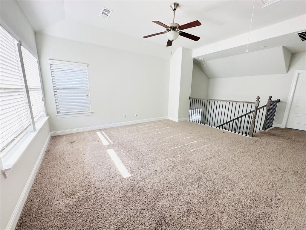 806 Davids Way Allen, TX 75013 - Photo 16 of 24 an empty room with windows and fan
