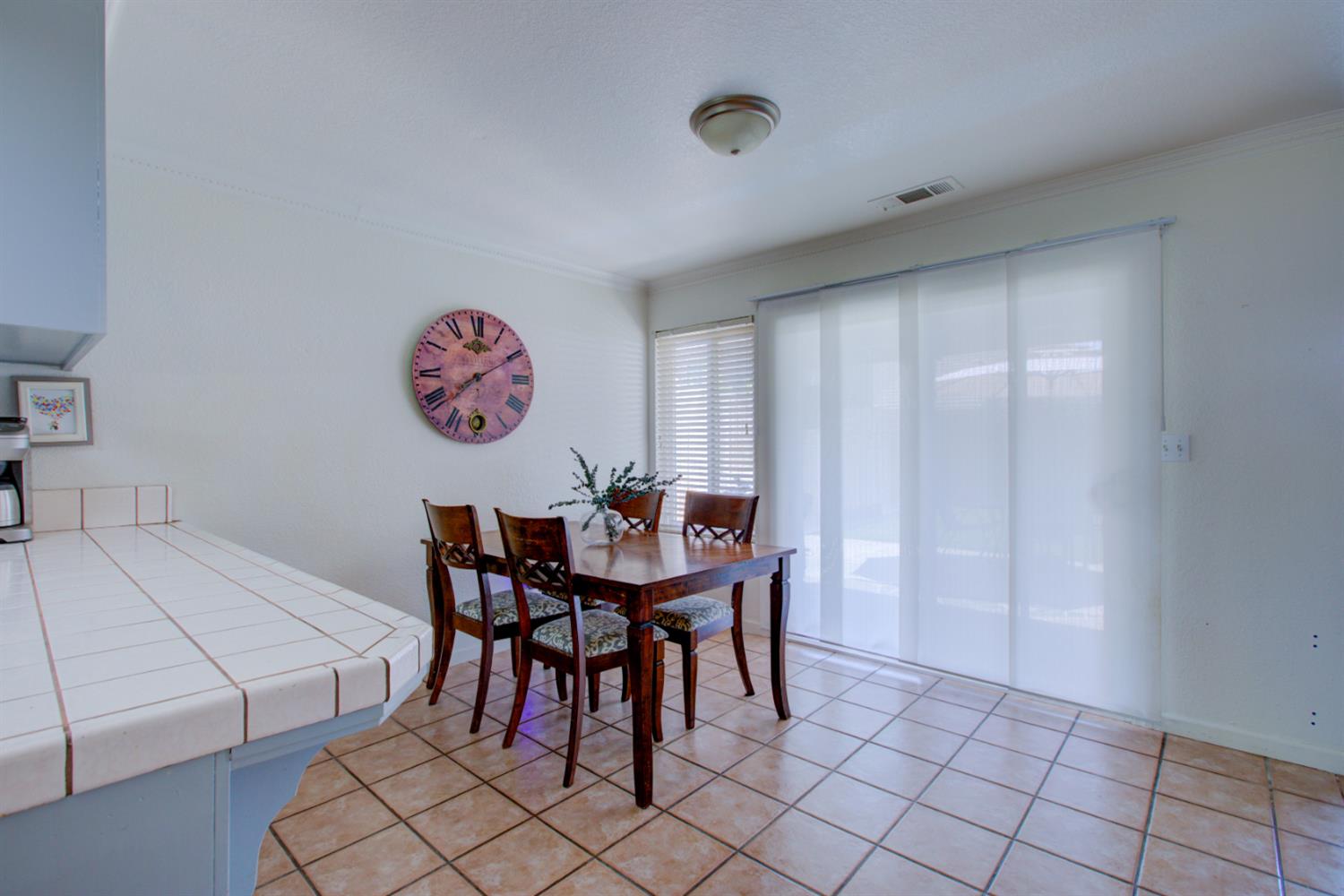 3816 Blaker Road Ceres, CA 95307 - Photo 12 of 40 Dining area and sliding glass door to backyard