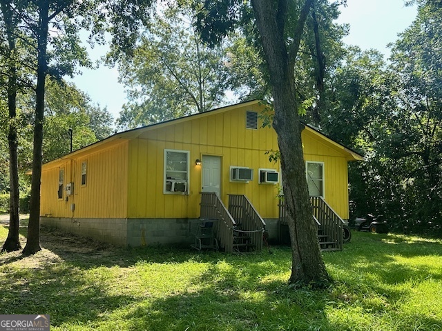 103 Floyd Street Statesboro, GA 30458 - Photo 11 of 22 a view of a house with a yard