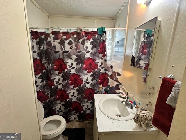 103 Floyd Street Statesboro, GA 30458 - Photo 15 of 22 a bathroom with a sink toilet and shower