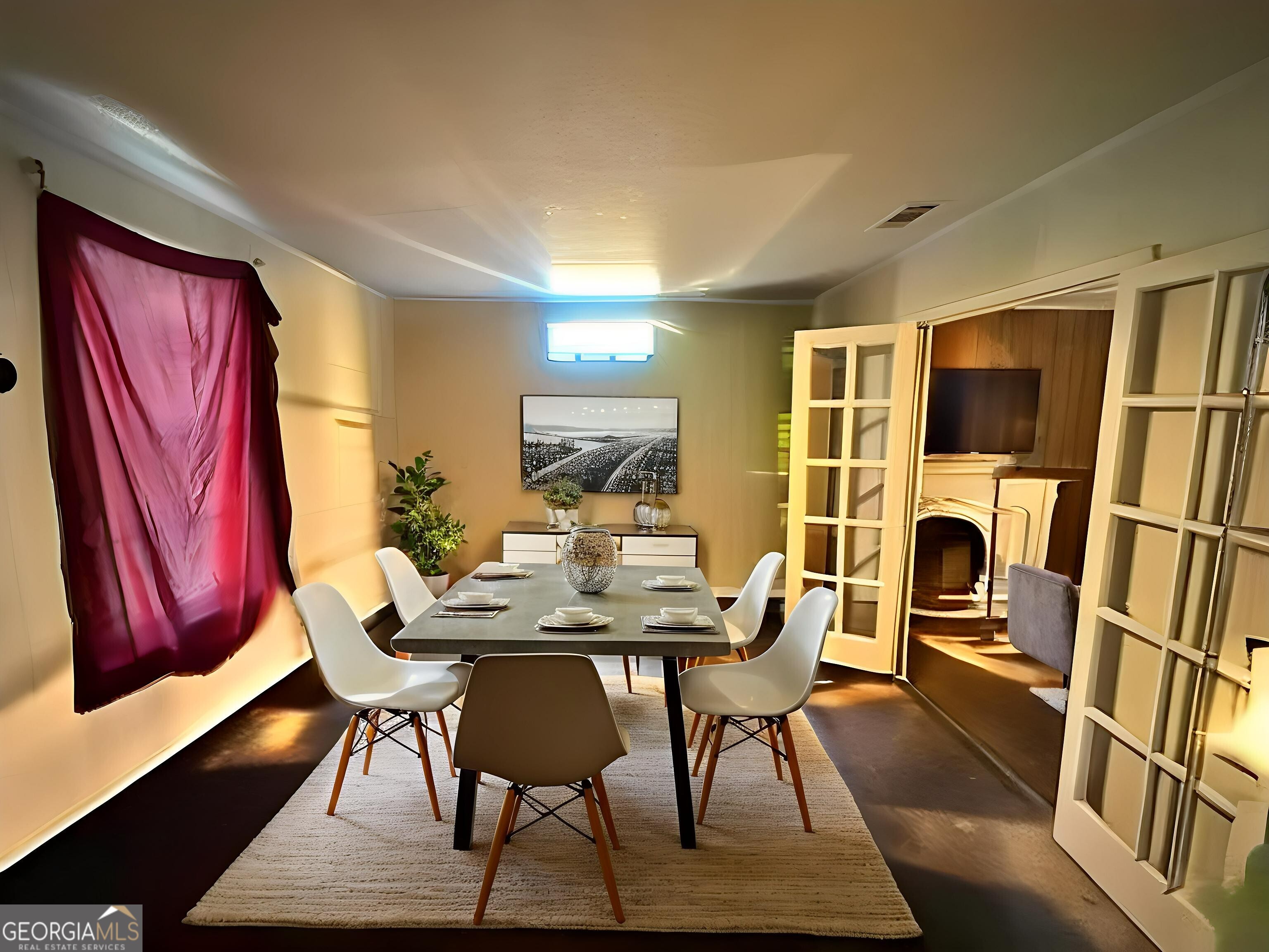 103 Floyd Street Statesboro, GA 30458 - Photo 18 of 22 a view of a dining room with furniture window and wooden floor