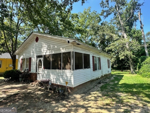 103 Floyd Street Statesboro, GA 30458 - Photo 20 of 22 a front view of a house with a yard