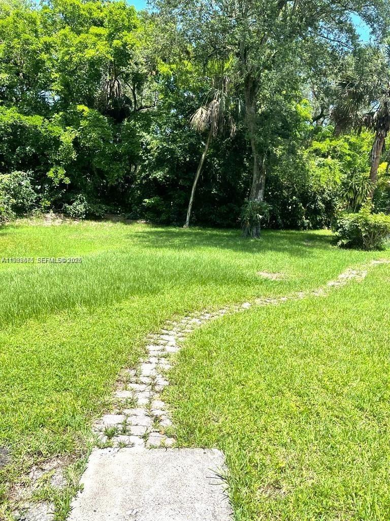 2913 Riverland Road Fort Lauderdale, FL 33312 - Photo 4 of 15 a view of a yard with a tree
